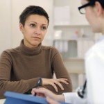 Psychologist and depressed patient at office
